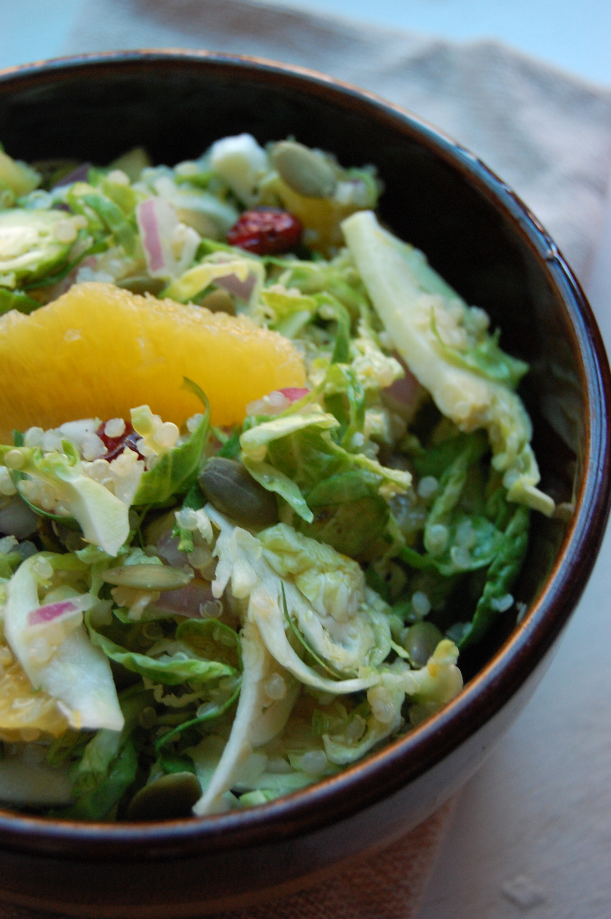 Shaved Brussel Sprout and Quinoa Salad with Cranberries and Oranges