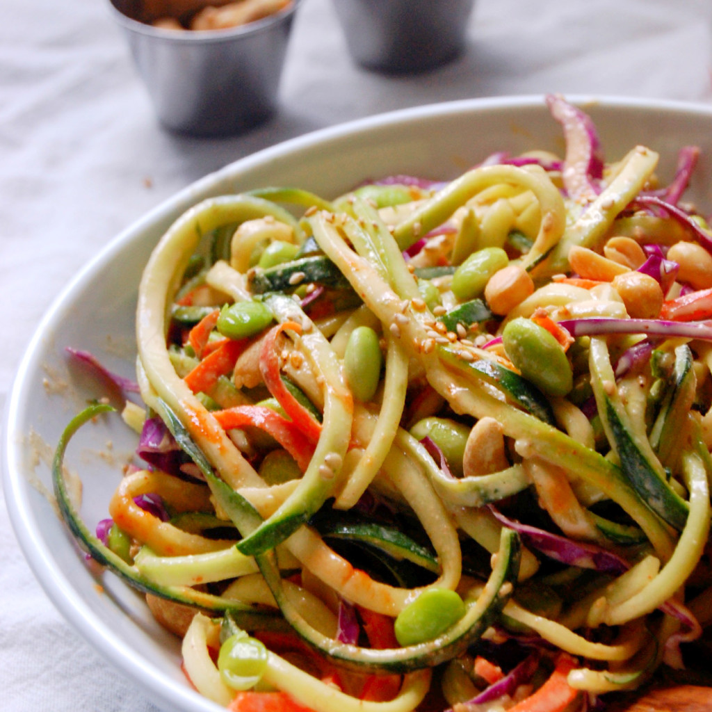 Saucy Peanut Veggie Noodles - made with zucchini and carrot noodles, red cabbage, and edamame | uprootkitchen.com