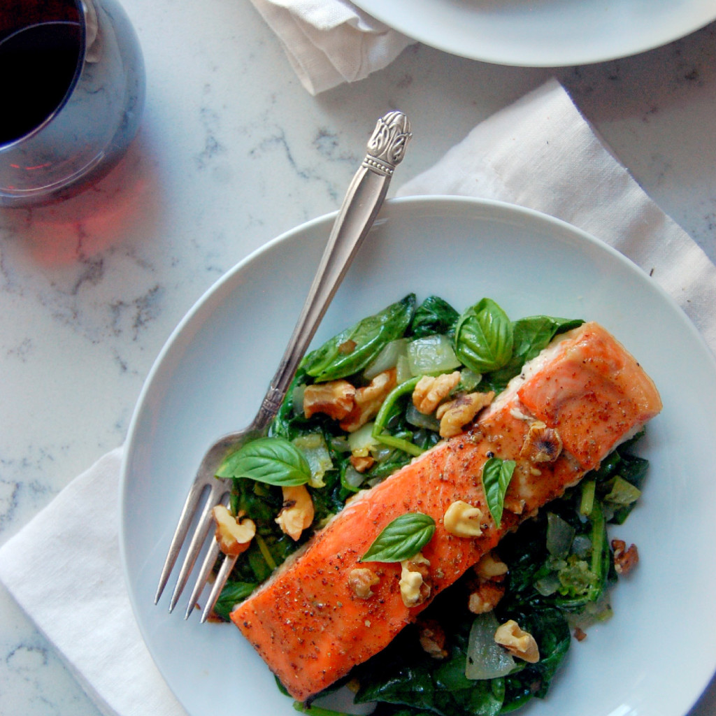 Glazed Dijon and Maple Salmon with Wilted Garlic and Basil Spinach, a healthy and gluten-free 30 minute meal that anyone will love! | uprootfromoregon.com