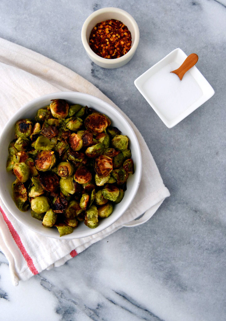 My simple technique for roasting Brussels sprouts to perfection, with just salt, pepper, and red pepper flakes! | uprootkitchen.com