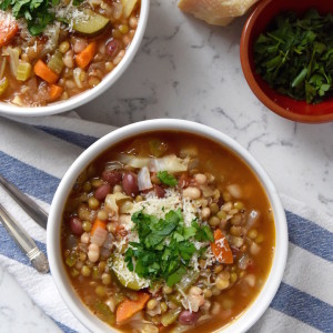 This Lentil Minestrone Soup is full of Italian flavor, plant-based protein and hearty veggies. Make it for the week! | uprootkitchen.com