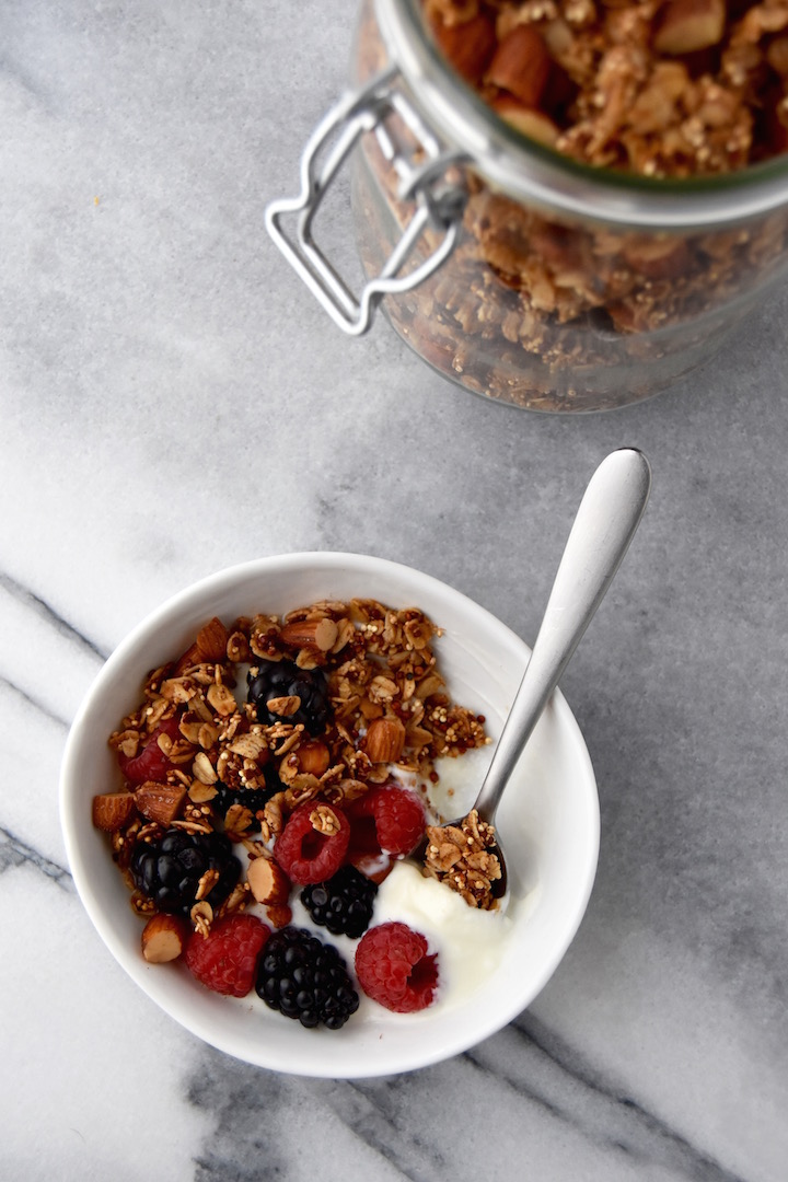 This Quinoa Almond Crunch Granola is perfect over a bowl of yogurt or a thick smoothie, or served with berries and milk. | uprootkitchen.com