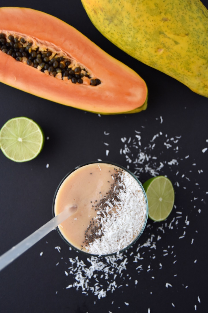 This Tropical Papaya Smoothie is a delicious and fresh summer sipper that will cool you down with the flavors of papaya, coconut, banana and lime. | uprootkitchen.com