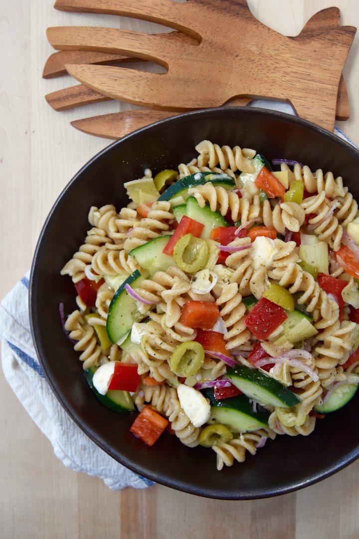 This Whole Wheat Cold Italian Pasta Salad is a healthier version than picnic staples. A homemade dressing completes this dish to share this summer.