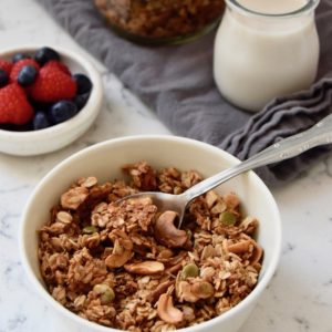 Healthy Granola made with coconut oil, maple syrup, nuts and seeds | uprootkitchen.com